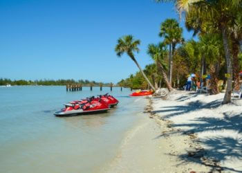 MustDo.com | Pure Naples jet ski rentals rest on the beach shore Naples and Marco Island, Florida. Must Do Visitor Guides #vacation #jetski #florida