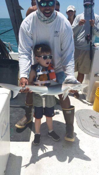 Exciting! Five year old's first shark catch aboard Sea Trek in Fort Myers Beach, Florida