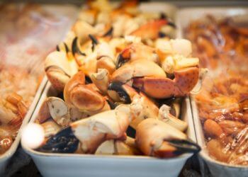 MustDo.com | Fresh Stone crab claws Captain & Krewe Seafood Market & Restaurant downtown Naples, Florida.