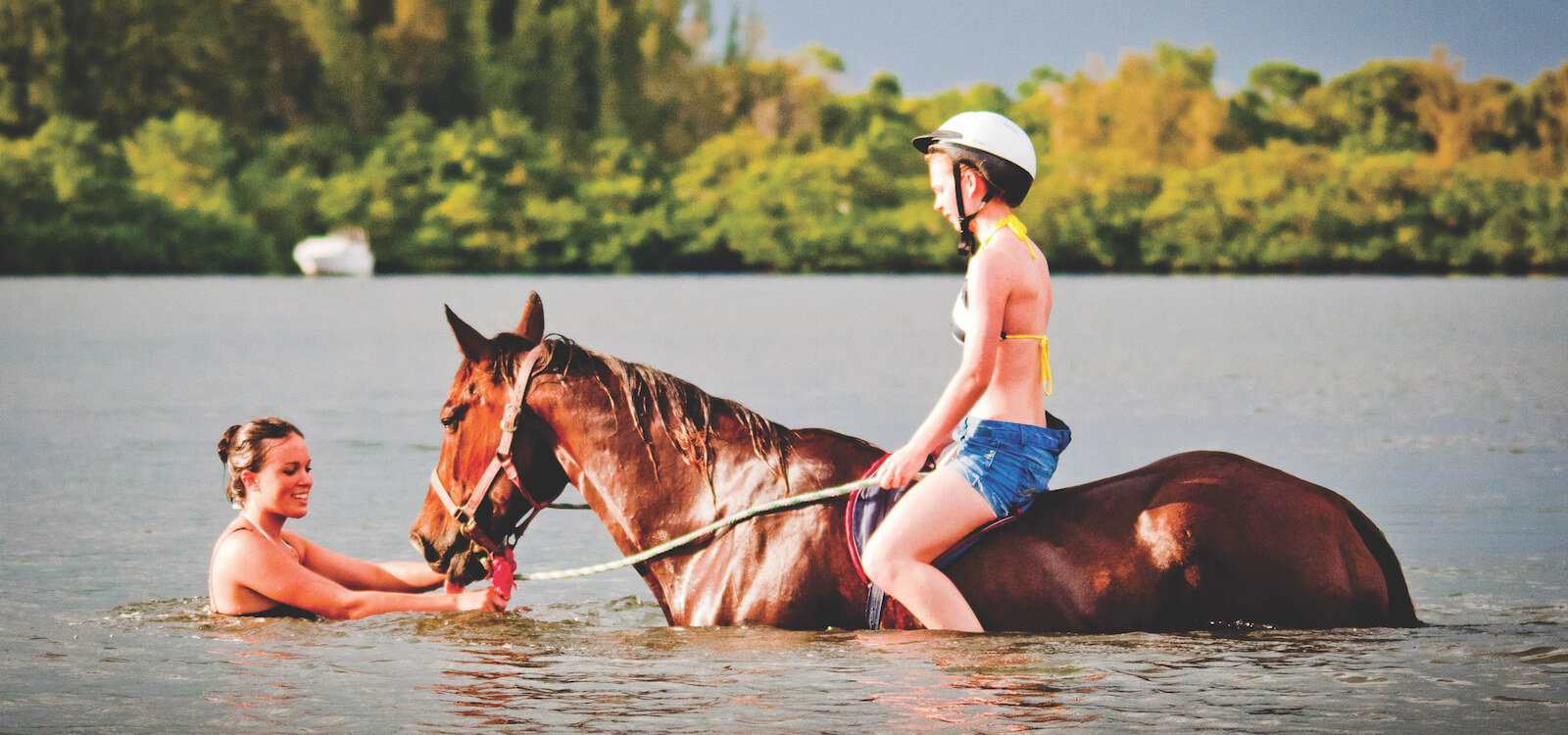 MustDo.com | Fun and exciting horseback riding along the beach at Palma Sola Bay, Bradenton, Florida, USA.
