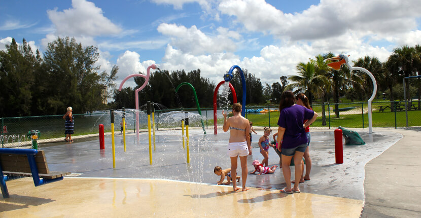 Kids splash fountain at Lakes Regional Park, Fort Myers, Florida USA. Must Do Visitor Guides Florida vacation information. MustDo.com
