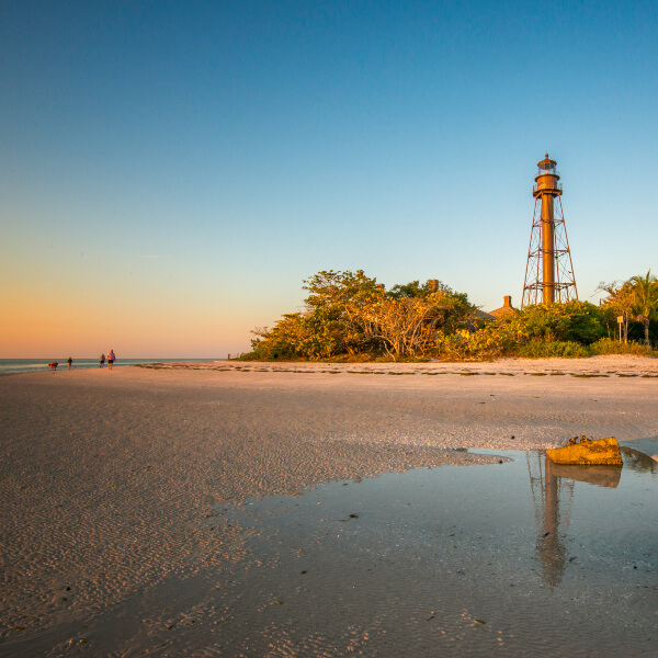Sanibel Lighthouse. The lighthouse and beach are located on the eastern tip of Sanibel, wrapping around to the bay side offering both Gulf of Mexico and Estero Bay views. Photo by Jennifer Brinkman. Must Do Visitor Guides, MustDo.com