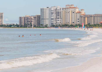 South Marco Island Beach Access is one of two public beach access points on Marco Island – and the less busy of the two. This is a terrific beach for families to go shelling, beach fishing, or to watch dolphins playing in the surf. Photo by Debi Pittman Wilkey. MustDo.com
