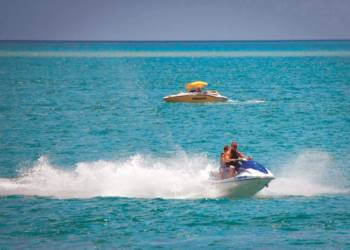 Jet ski rentals and tours, water sport activities on the Gulf of Mexico in Southwest Florida. Fort Myers Beach, Naples, Sanibel, Sarasota, Siesta Key. Photo by Debi Pittman Wilkey. | Must Do Visitor Guides, MustDo.com