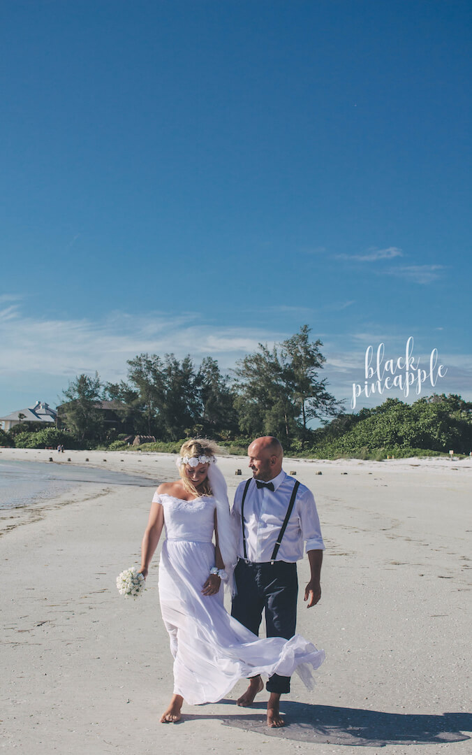 The sunny climate, beautiful white sandy beaches, flaming sunsets, professional photographers, florists, top caterers, and superb resorts make it easy to plan your dream beach wedding in Southwest Florida. Photo by Elizabeth Barnett Black Pineapple Photography | MustDo.com