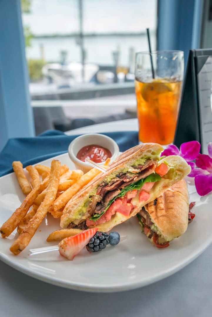 Enjoy the award-winning dinner menu, fine wines, Sunday Brunch, celebrate a wedding or anniversary overlooking Little Sarasota Bay at Ophelia’s on the Bay in Siesta Key, Florida. Photo by Jennifer Brinkman | Must Do Visitor Guides