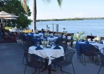 Enjoy the award-winning dinner menu, fine wines, Sunday Brunch, celebrate a wedding or anniversary overlooking Little Sarasota Bay at Ophelia’s on the Bay in Siesta Key, Florida. | Must Do Visitor Guides