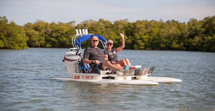 Explore the waters of Estero Bay and Lovers Key on a 2-person power catamaran. The two-person motorized catamaran is just over 11 feet long, has two side-by-side seats, and a Bimini top for shade. The boats are stable and quiet–an important plus if you want to see local Fort Myers, Florida wildlife. Photo by Mary Carol Fitzgerald. #fortmyersbeach #vacation #ecotours #florida
