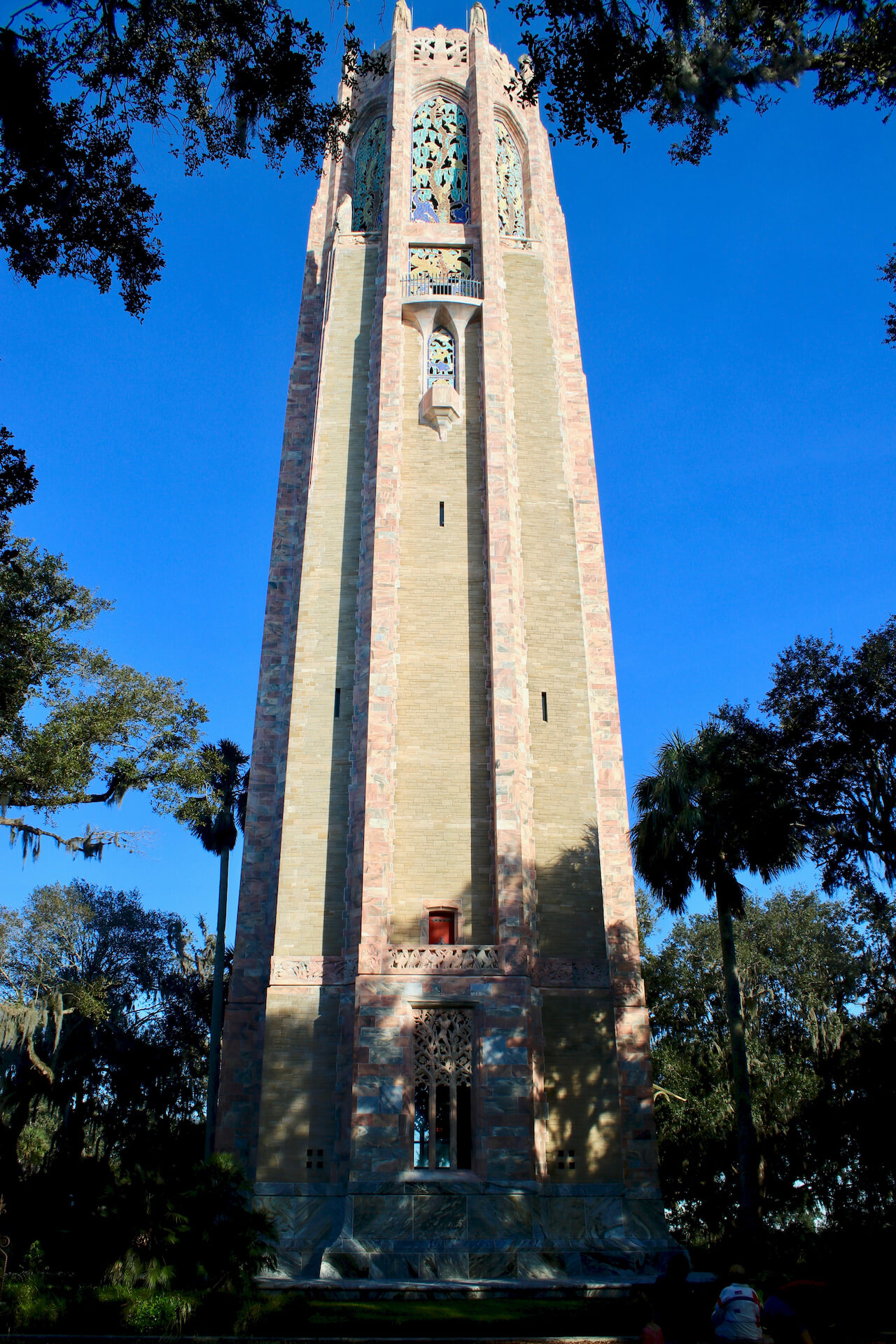 Carillon bell tower Bok Tower Gardens Lake Wales, Florida. Explore 50 acres of meandering pathways and gardens, listen to the beautiful bells of the Singing Tower carillon, and stroll through a Mediterranean-style mansion. Must Do Visitor Guides | MustDo.com