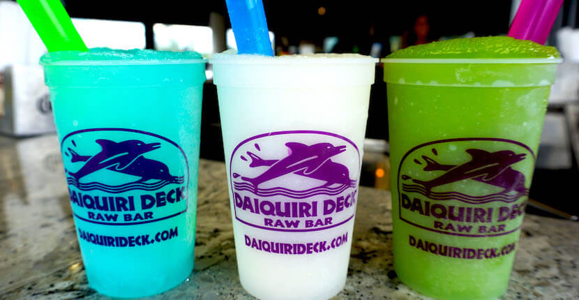 Daiquiri Deck Raw Bar features more than one dozen different frozen daiquiris at their restaurants in Siesta Key, St. Armands Circle, Sarasota, and Venice, Florida. Must Do Visitor Guides, MustDo.com.