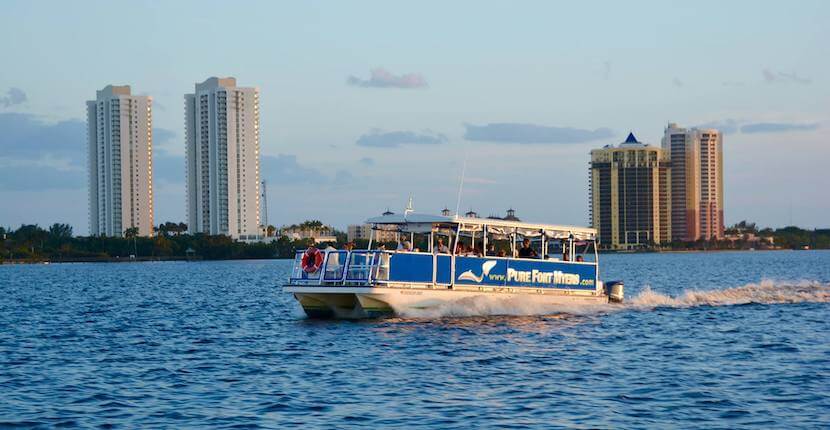 Pure Florida Narrated 90-minute Caloosahatchee River sunset cruise with views of Edison & Ford, downtown Fort Myers, Florida, bird rookeries, and mangroves.