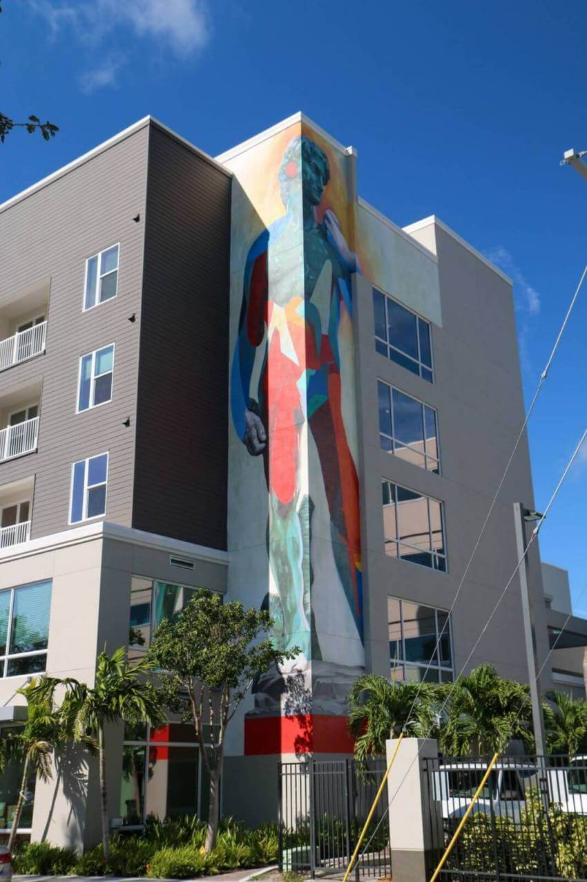 Colorful three-story, tessellated rendering of David, an homage to Michelangelo’s famous statue. Sarasota, Florida street art and murals. Photo credit Laurén Ettinger. Must Do Visitor Guides | MustDo.com