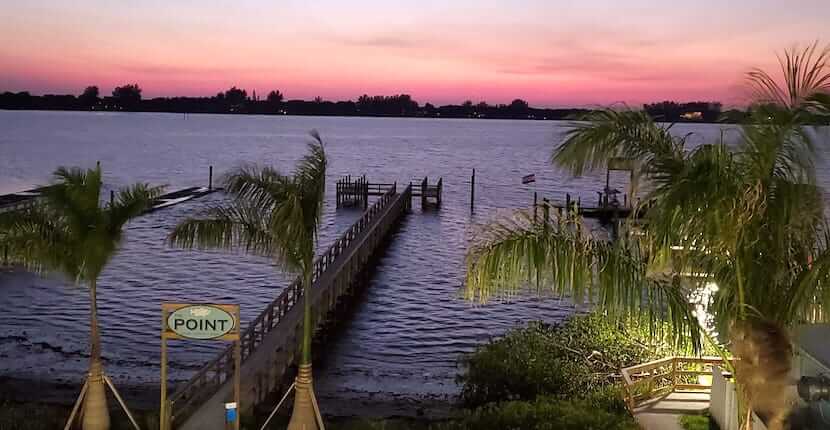 The Point waterfront restaurant and bar in Osprey is just minutes from Venice and Siesta Key, Florida making it a great spot to enjoy drinks with friends while watching the sunset over Little Sarasota Bay.