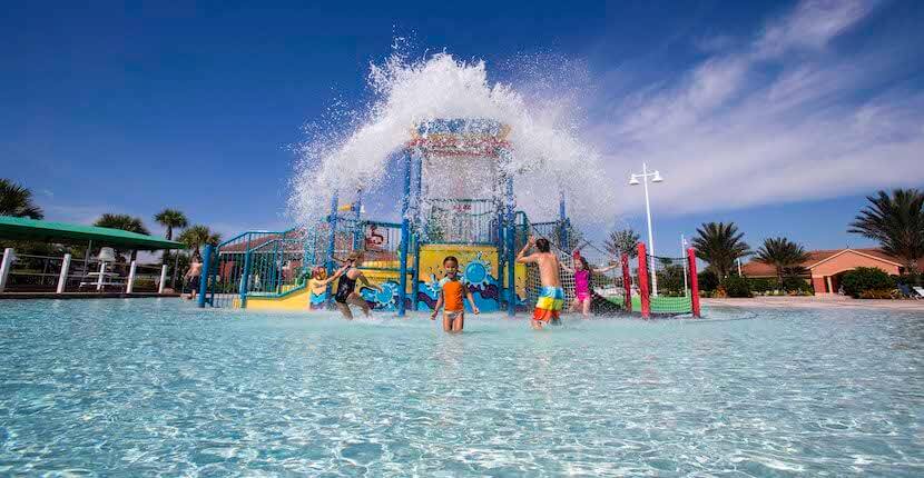 Kids splashing in Ave Maria waterpark in Ave Maria, Florida.