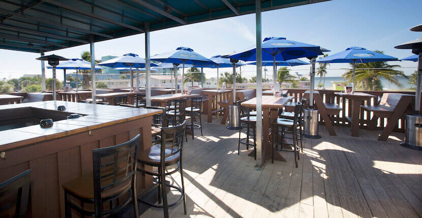 Rooftop bar and outdoor dining at The Whale restaurant and bar in Fort Myers Beach, Florida.