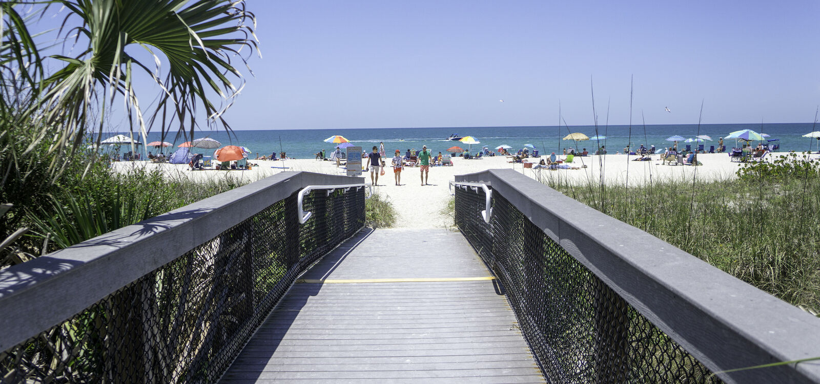 Beach path to white sand beach at Nokomis Beach near Venice, Florida